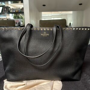 Hardly used Valentino black leather tote bag with rock studs.good condition